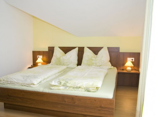 Schlafzimmer im Appartement Smaragd im Haus Diamant in Flachau